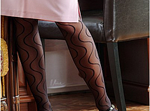 Busty Babe In Patterned Pantyhose