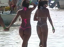 Hot topless bikini teens by the beach